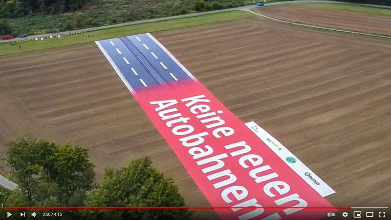 Transparent-Aktion (Klick führt zu YouTube) Transparent-Aktion